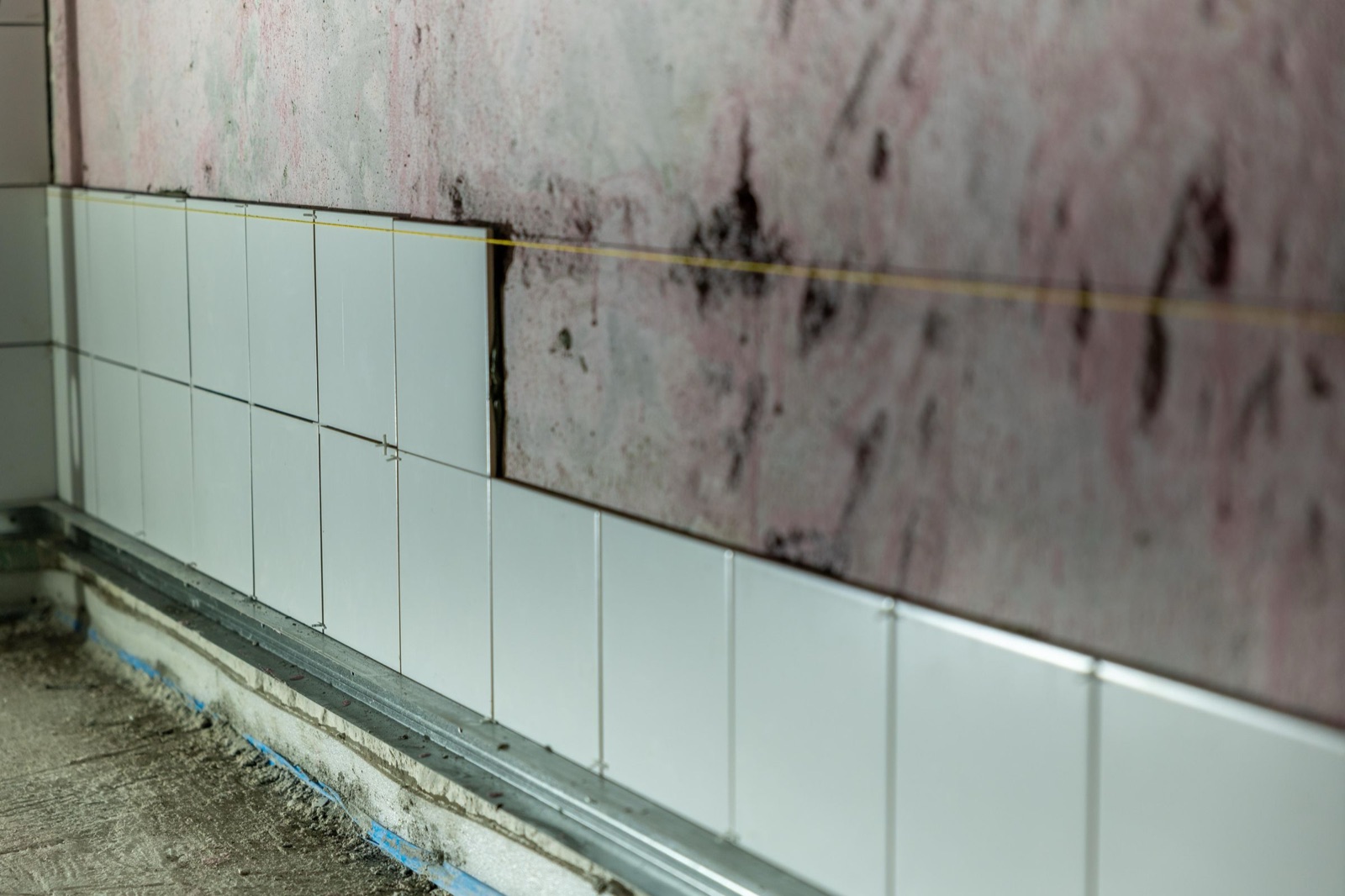 New tile going up during a bathroom remodel