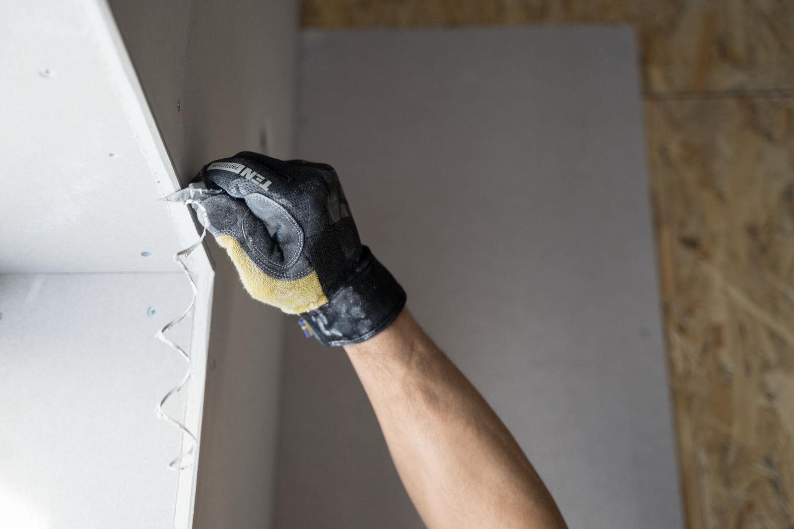 Hanging drywall during a whole-home remodel
